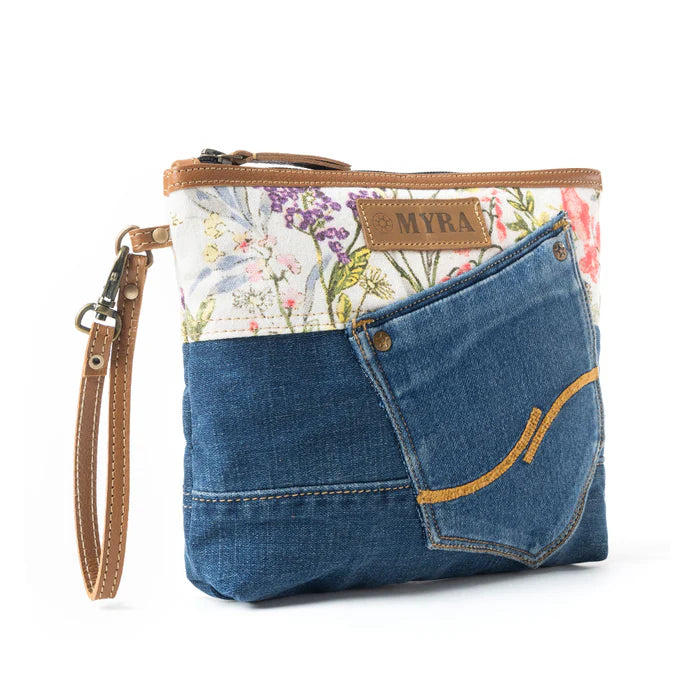 Myra denim and floral patterned handbag with 'Myra' branding 