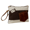 Myra Bag pouch clutch with brown and white design on a white background