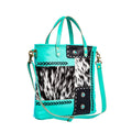 Myra turquoise handbag with cowhide pattern and decorative elements. 